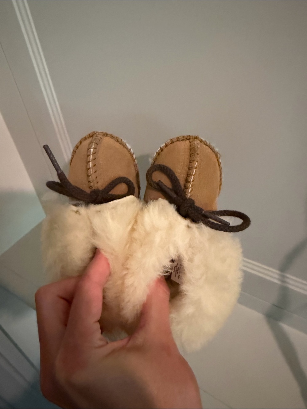 Minnetonka Tan and Cream Shearling Baby Moccasins